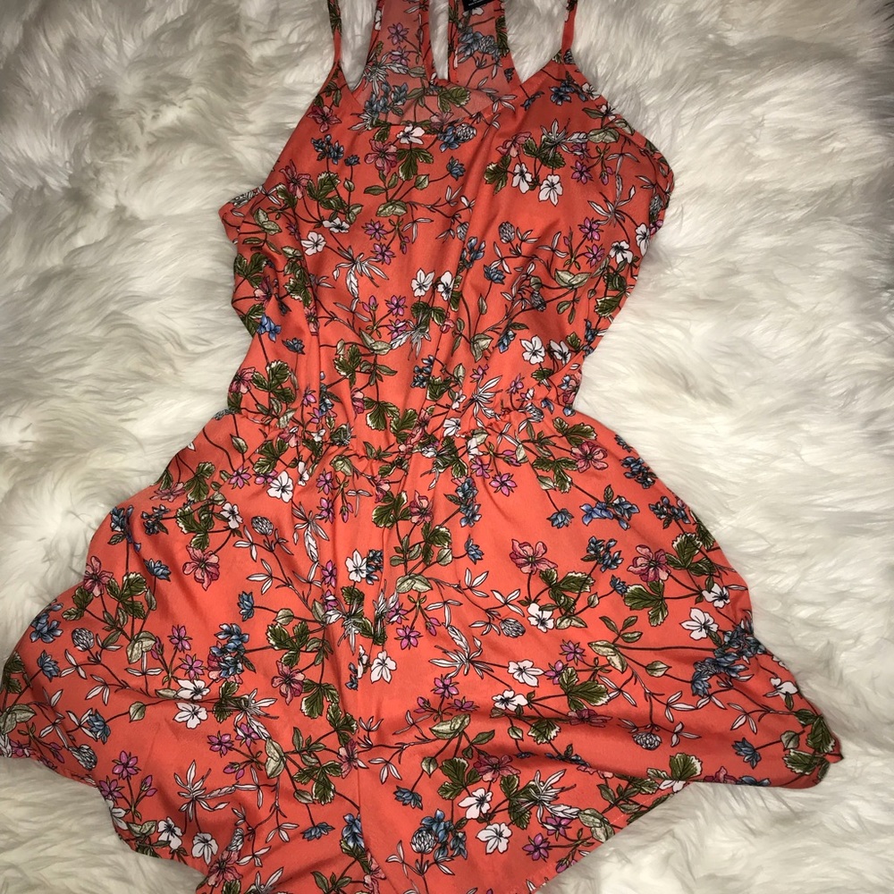 Bright orange/tangerine flower covered Romper